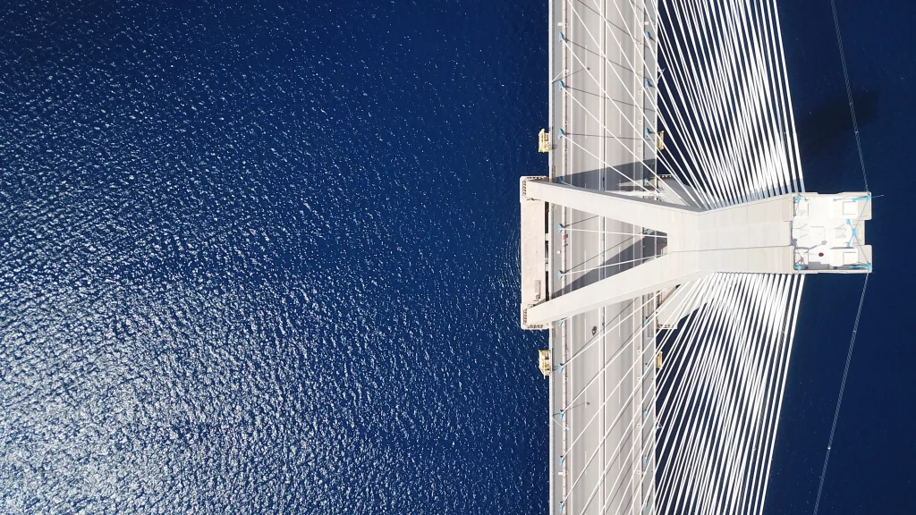 acco 2025 blue ocean white suspension bridge